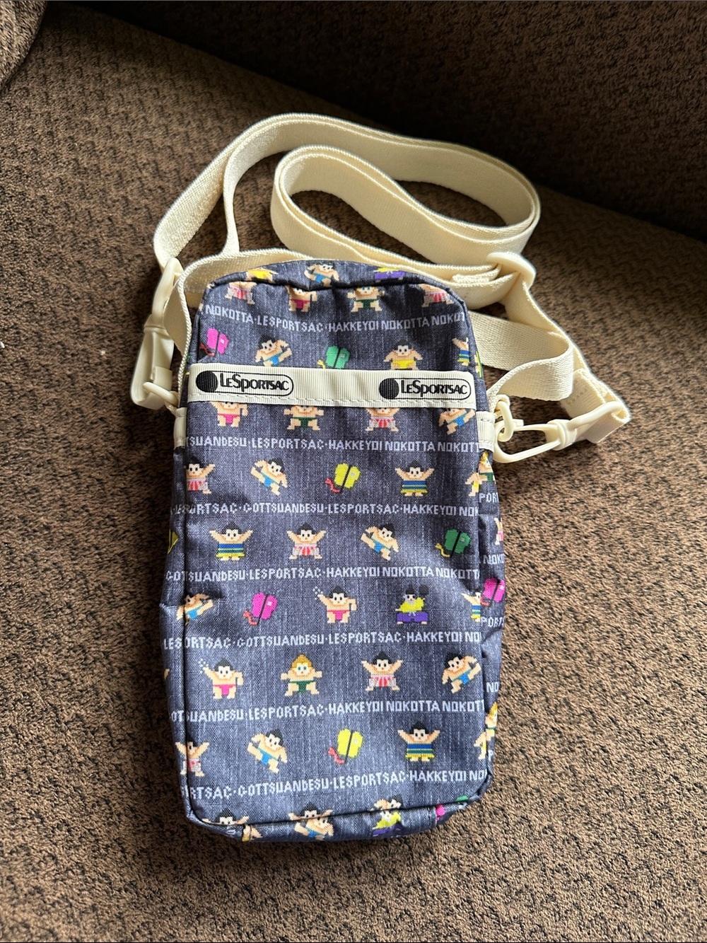 Lesportsac mini phone Crossbody with sumo wrestler print
